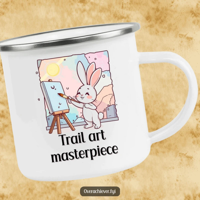 Funny bunny painting camping mug showing a cute bunny artist painting a vast mural with a tiny brush in an outdoor setting.