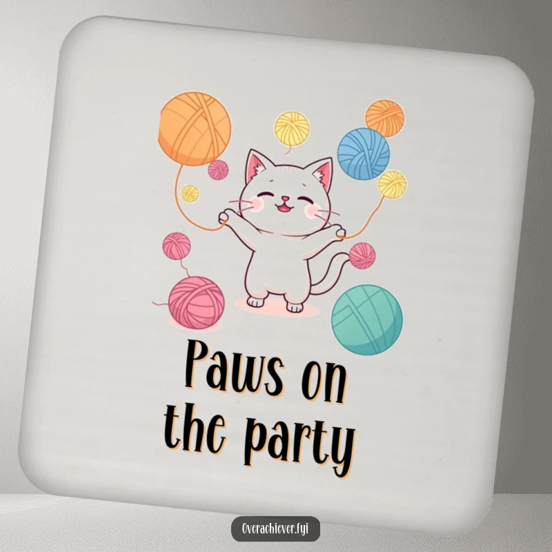 Funny drink coasters depicting a Kawaii cat adorably juggling a mountain of yarn balls, protecting surfaces with feline charm.