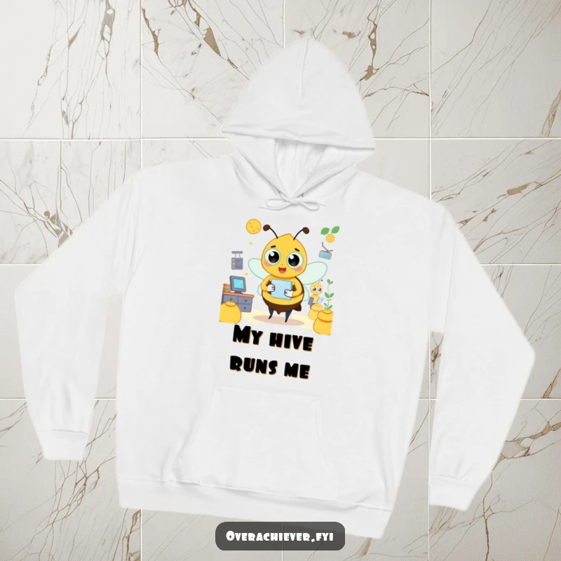Funny bee hoodie featuring a busy character managing a hive with multiple tasks and managers, cozy and efficient.