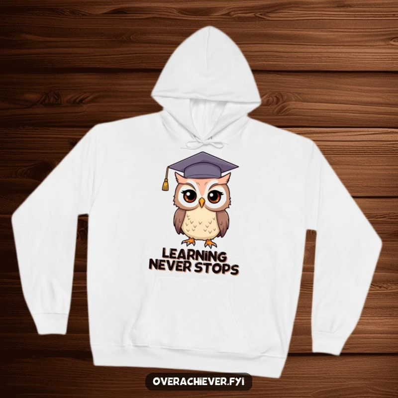 Funny graduation owl hoodie featuring a determined owl in a comically large graduation cap, a warm and witty gift.