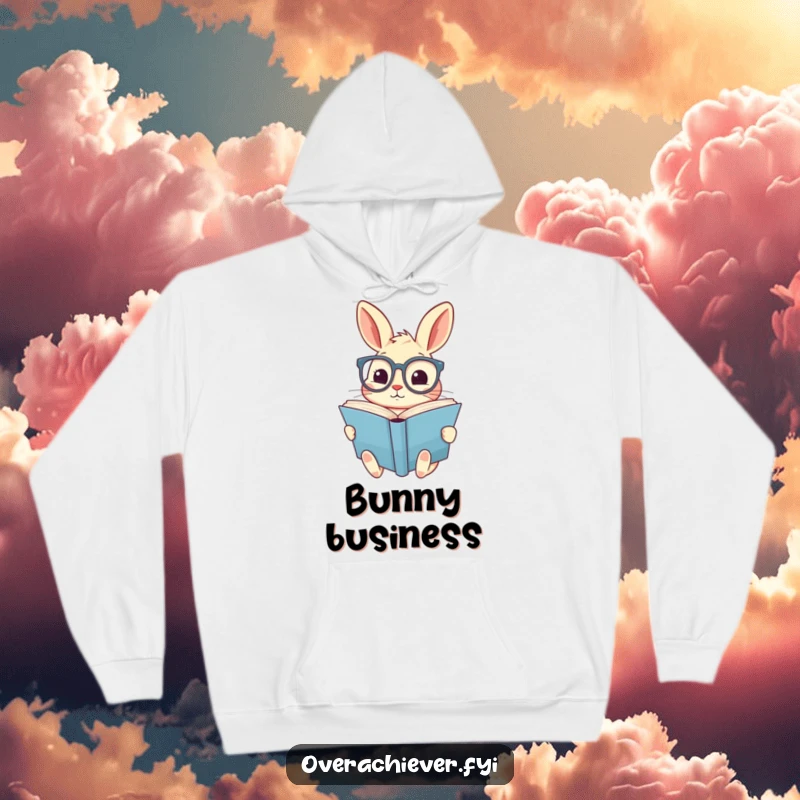Funny hoodie with a cute rabbit wearing oversized spectacles, diligently reading a giant book, perfect for cozy reading sessions.