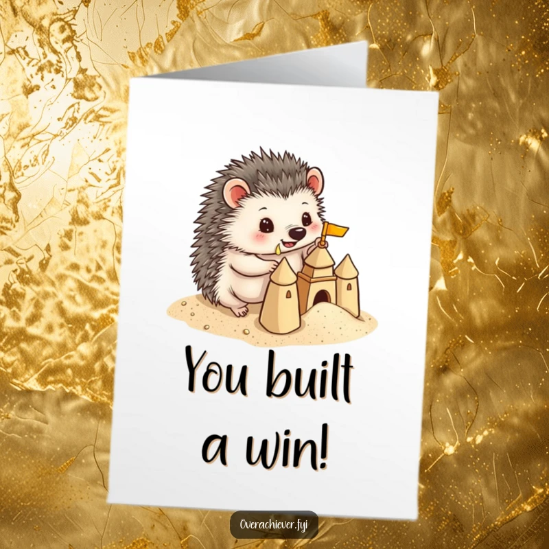 Funny Free Printable Congrats Card: A playful hedgehog building a detailed sandcastle, celebrating success with precision and prickly charm.