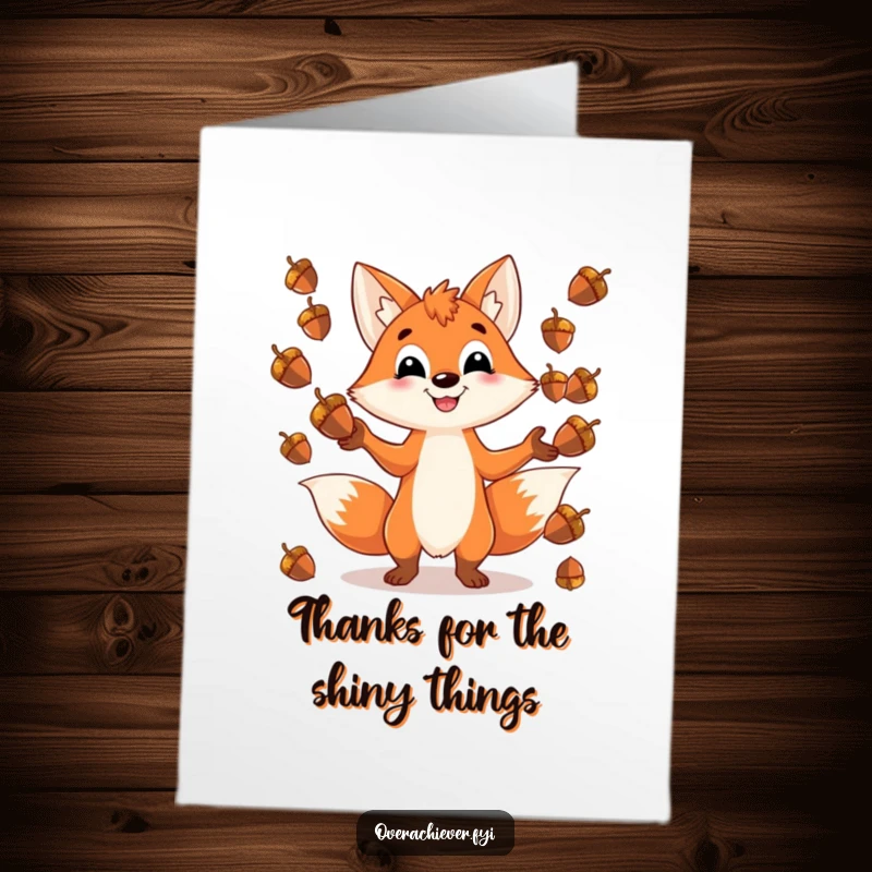 Funny Free Printable Thank You Card of a smiling fox, juggling acorns with flair as a token of thanks.