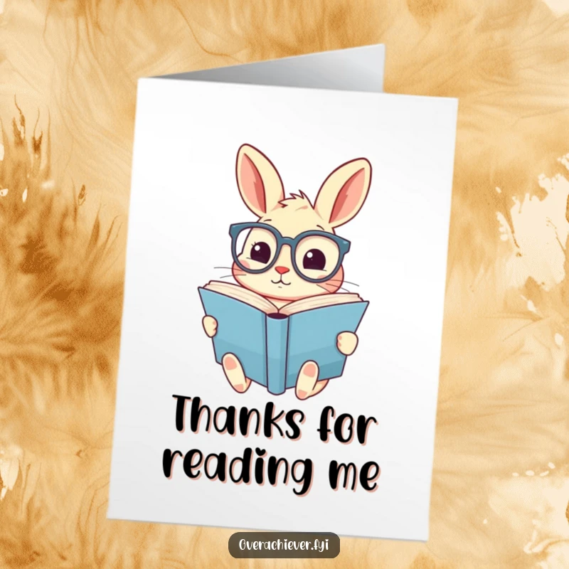 Funny Free Printable Thank You Card of an adorable rabbit with glasses, looking up gratefully from a giant book.