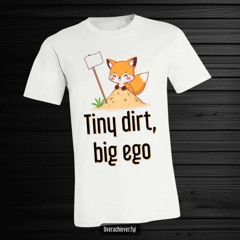 Funny fox planting a giant flag in a small mound of dirt, capturing hilarious ambition on a comfortable tee, perfect funny gift.