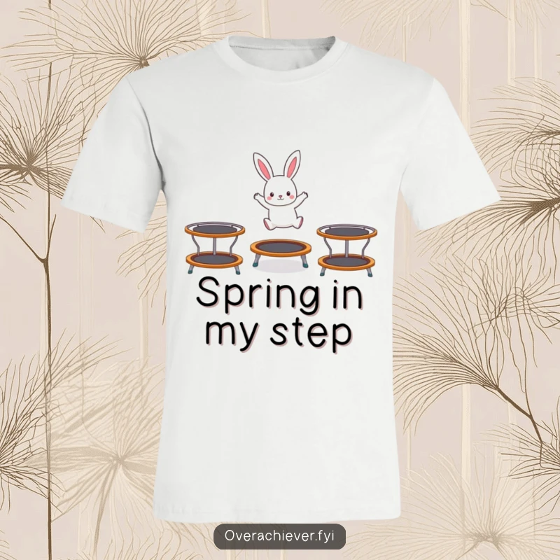 Funny t-shirt featuring a tiny rabbit character expertly hopping on three trampolines at once, showcasing agility and playful exuberance.