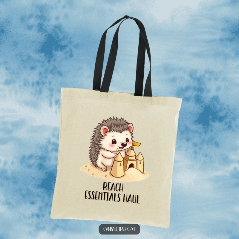 Funny Hedgehog Tote Bag: A playful hedgehog building a miniature sandcastle with precise detail, ideal for beach trips with humor.