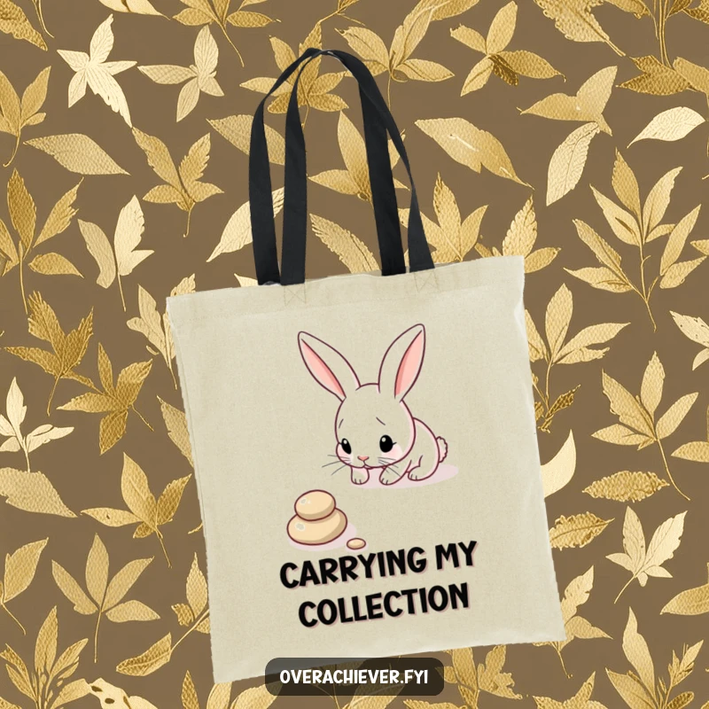 Funny Bunny Tote Bag: A focused bunny carefully arranging pebbles in a perfect line, ideal for shopping with a humorous touch.
