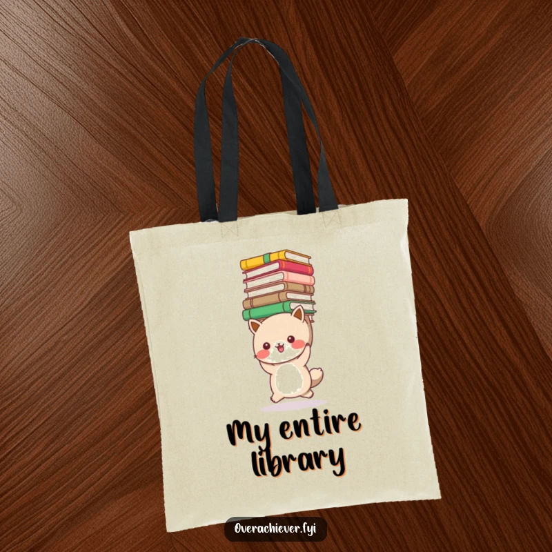 Funny book stack animal tote bag with a cute creature carrying a huge pile of books, celebrating passionate readers. Practical and humorous accessory.